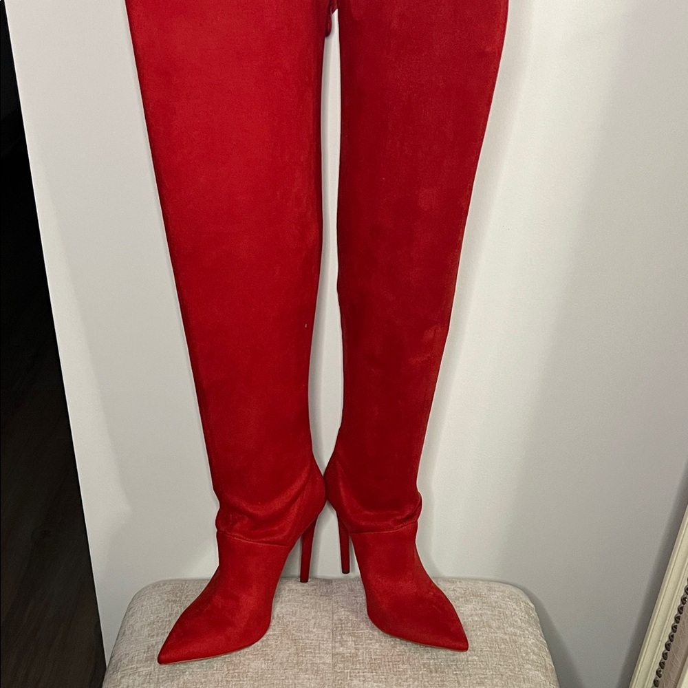 Jennifer Lopez Striking Scarlet Heeled Boots